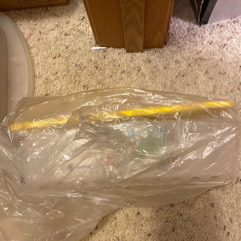 New in package, Tupperware fridge, smart, medium lawn, sunny, yellow lid.